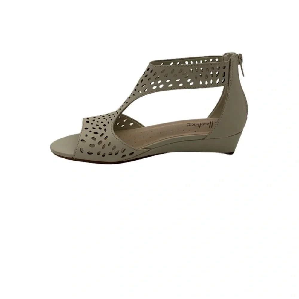 Collection by Clark’s. Abigail Ruby in Ivory. Perforated leather‎ wedges. 8.5
